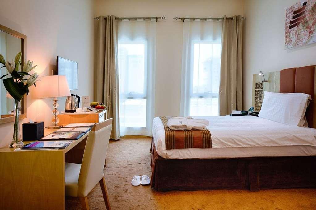 Tamani Marina Hotel & Apartments Dubai Quarto foto A bedroom at the Jumeirah Creekside